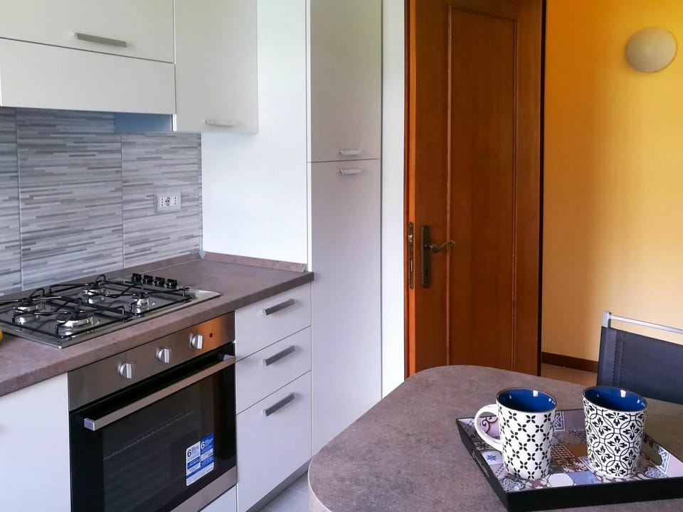 Cabinetry, Furniture, Property, Blue, Building, Drawer, Door, Wood, Lighting, Kitchen Stove