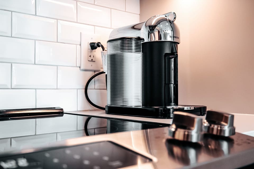 Wake up to a cup of Nespresso coffee and choose from the variety of complementary Nespresso coffee pods 