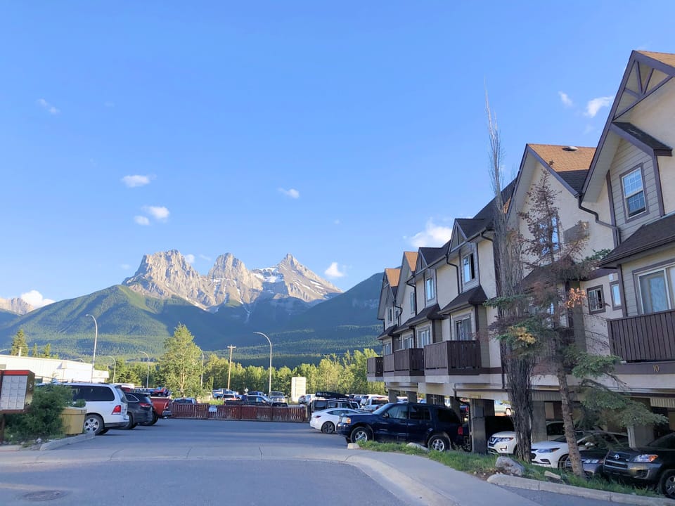 Condo parking lot with a stunning view of the Three Sisters!