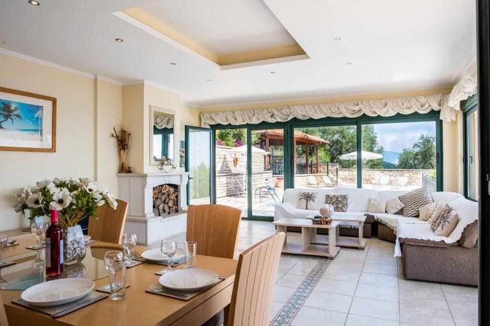 Upper lounge looking onto the pool and BBQ area