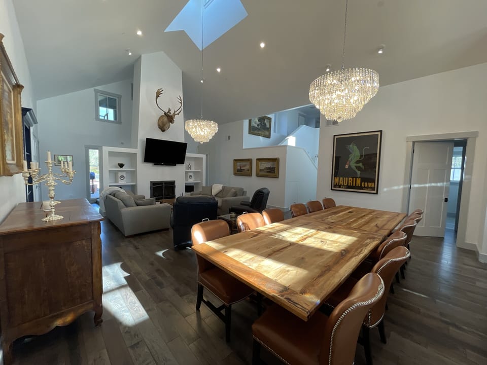 Handmade Dinning Table from trees from the property. Made by owners (seats 14)