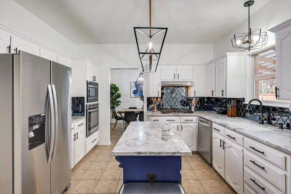 Full of bold charm and upgraded finishes, this fully equipped upscale kitchen is the stuff dream kitchens are made of!