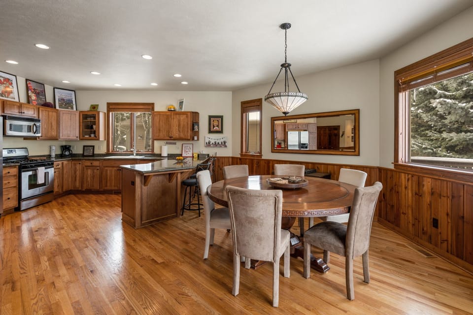 Large dining table can seat up to 6 guests.