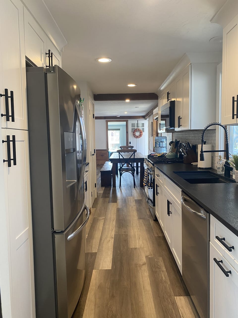 Kitchen looks into dining area