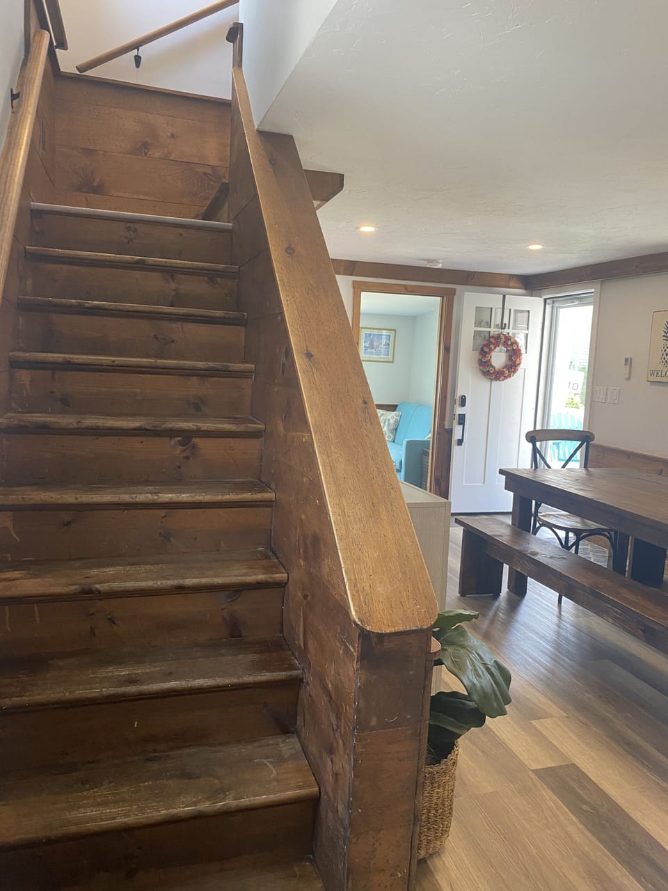 Dining space leads to upstairs