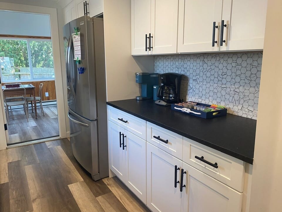 Kitchen leads into back game room