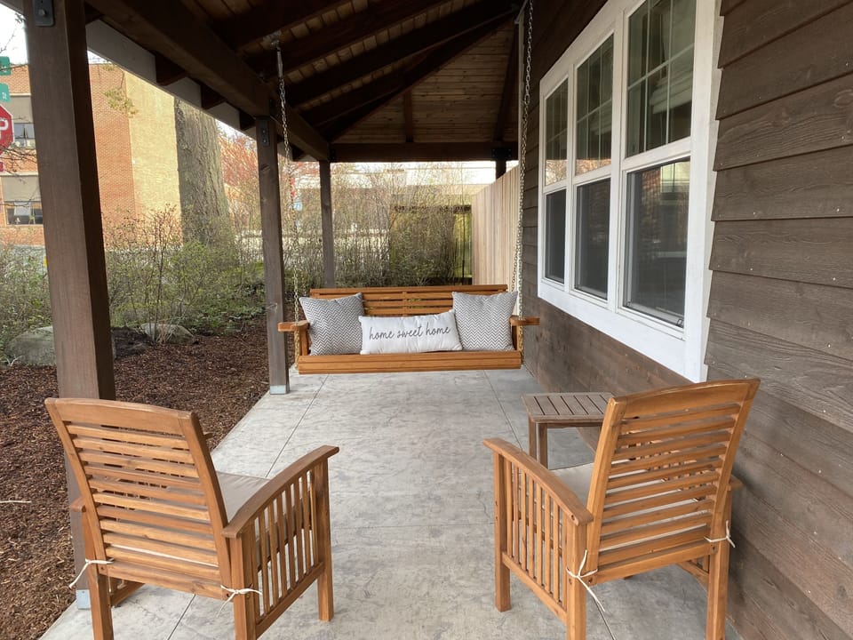 Cozy covered front porch for visiting