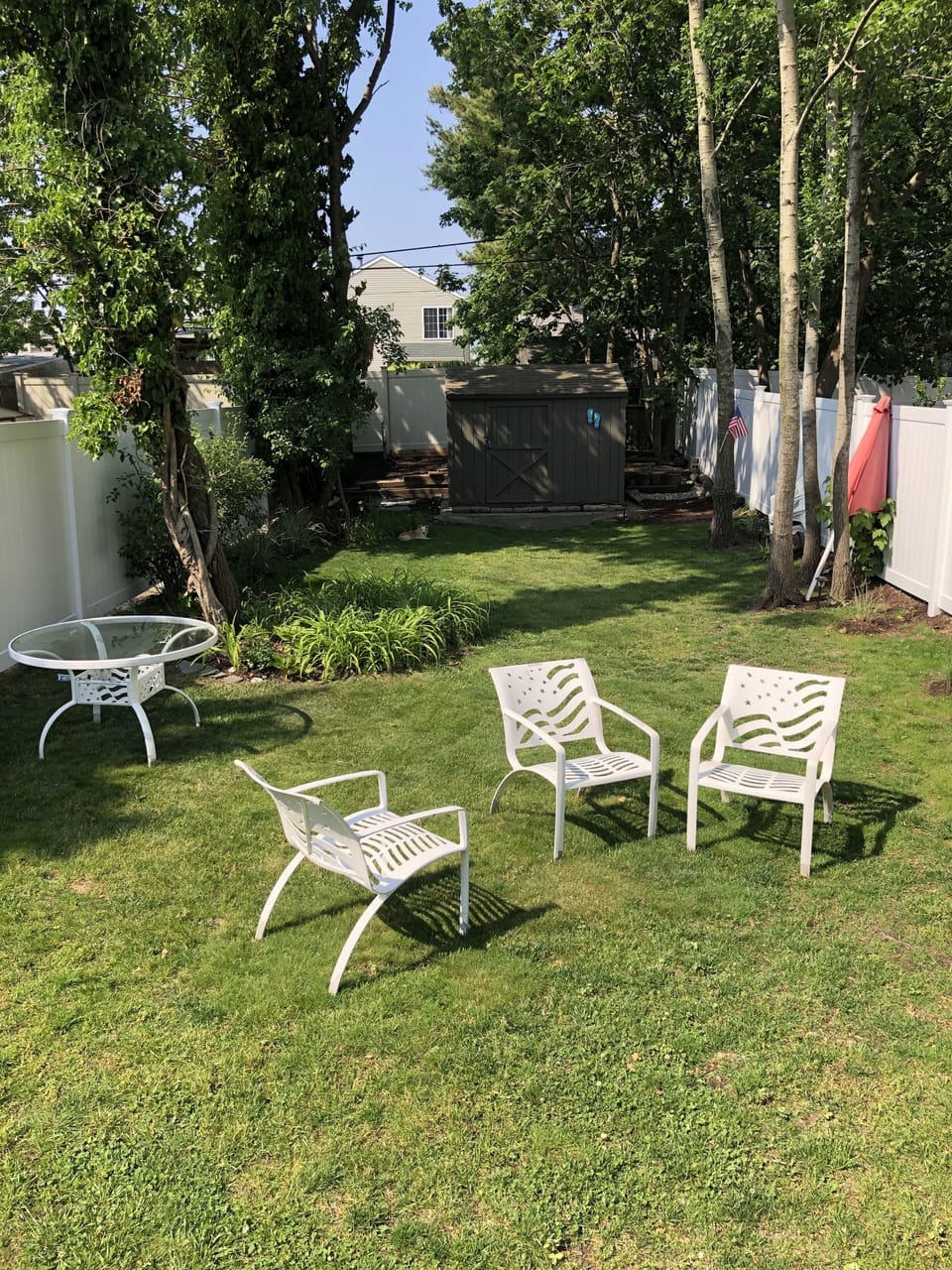 Large yard with tables/grill, play area