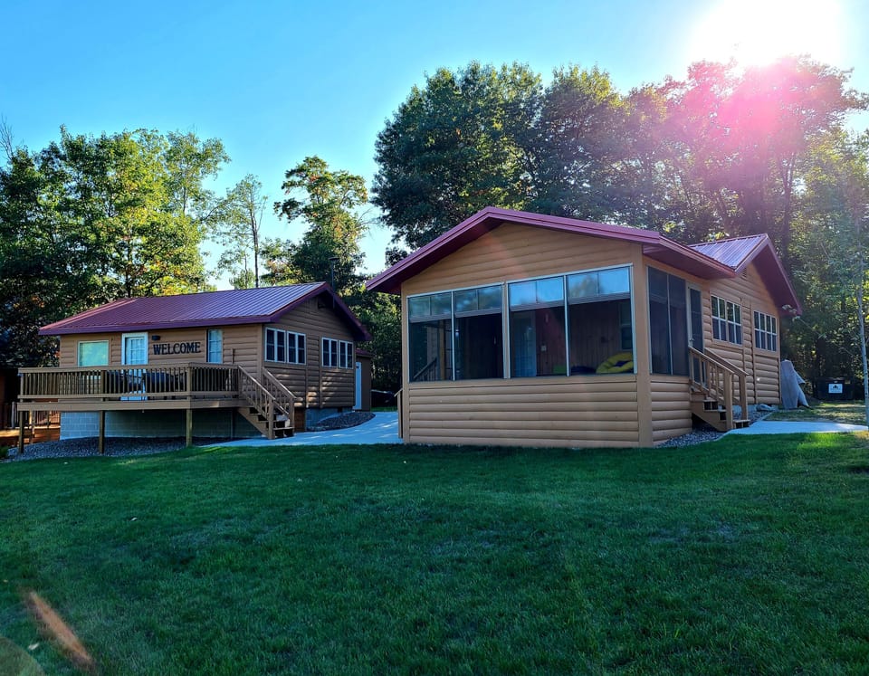 This listing includes two separate cabins with shared outdoor space. 