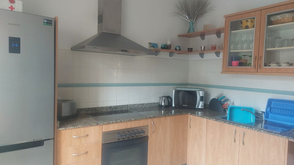 Fully fitted kitchen,  cooker, hob, fridge/freezer and coffee machine 