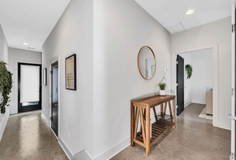 Bottom level- front door to leading to bedroom with two trundle beds