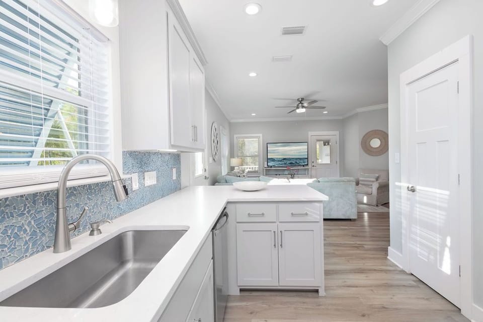 Kitchen - The spacious open kitchen features stainless appliances and is fully stocked with plenty of cookware and utensils for preparing meals during your stay.