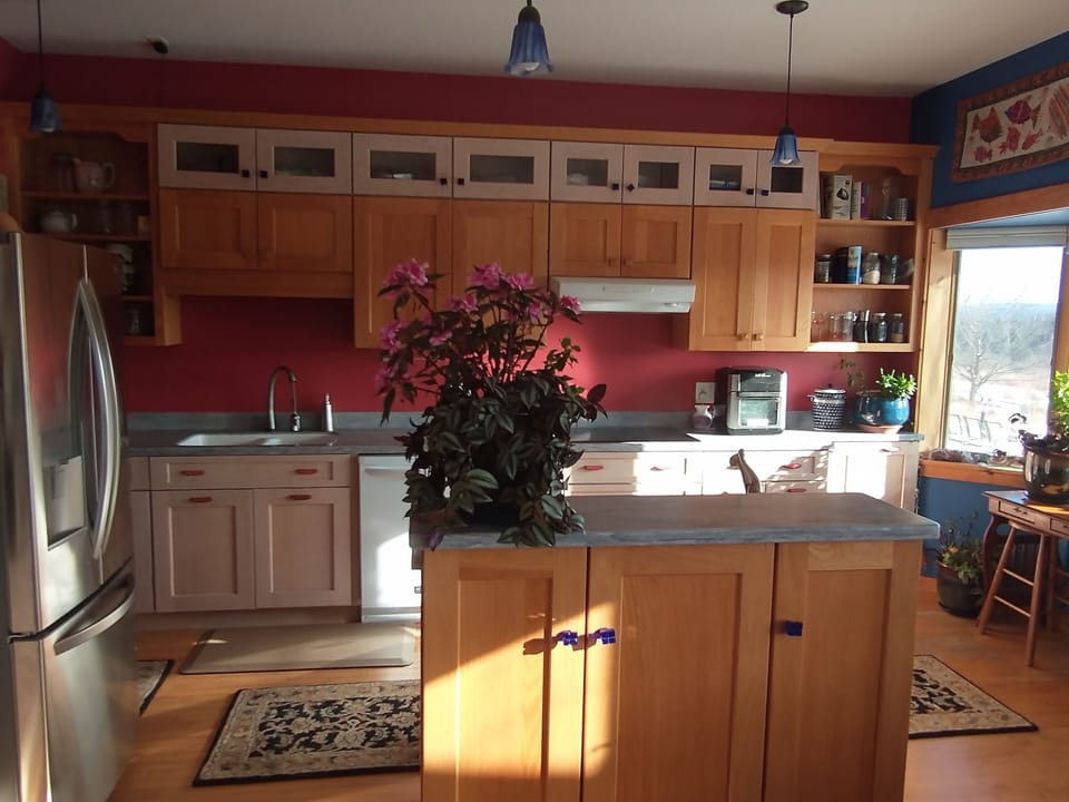 Fabulous kitchen has an island and 3rd sink. 