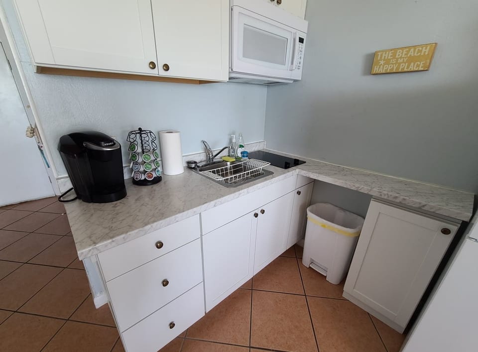 Kitchenette area and two burners for cooking. Coffee provided.