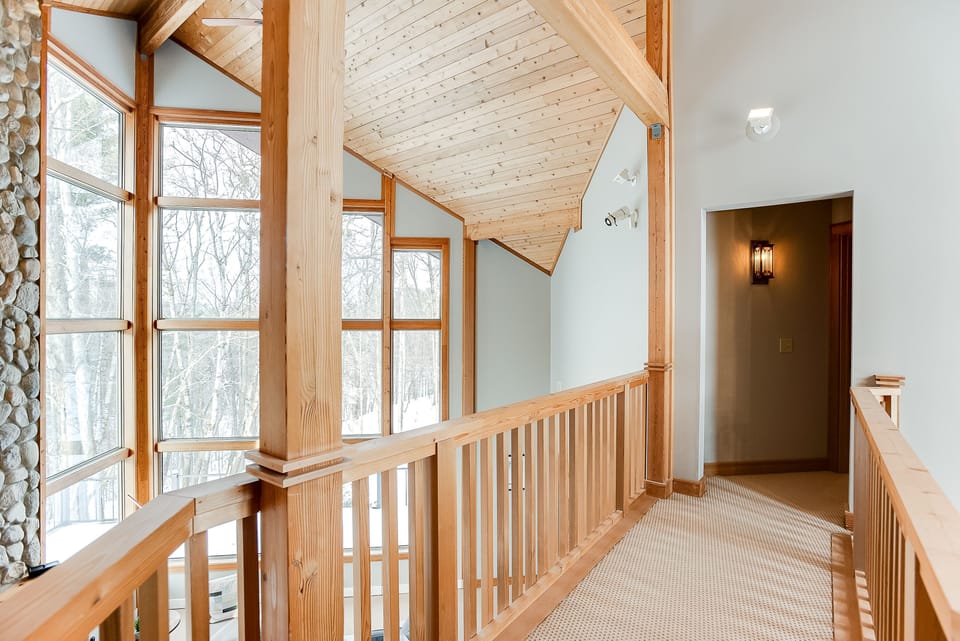 Walkway to the upstairs primary bedroom.