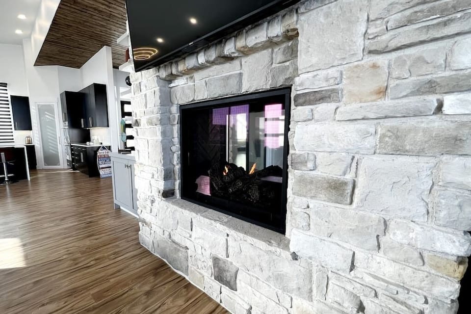 Double sided fireplace living room view.