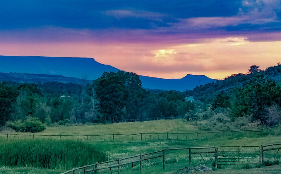 Enjoy western views of the Grand Mesa while you sip wine on the deck