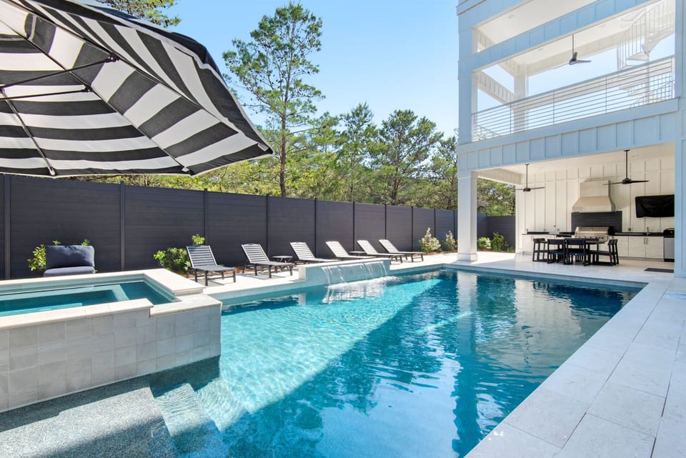 16x35 ft Pool with LED lights,  water feature, 7x7 spa and tanning shelf