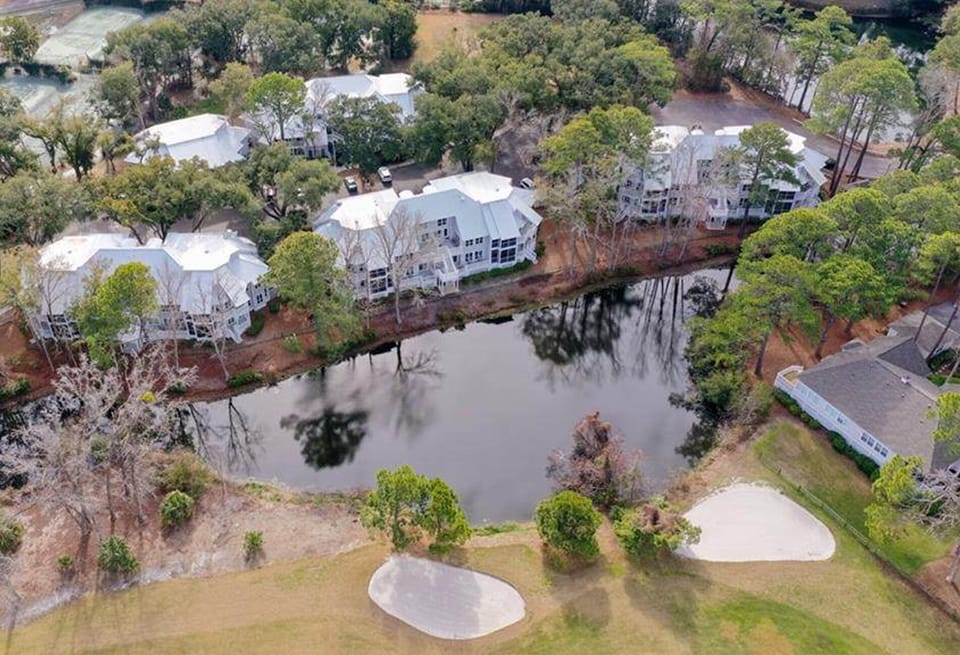 Bldg 5 in center overlooking Lagoon & Port Royal Golf course