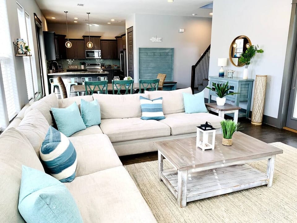 Large comfortable couch with door to front patio.