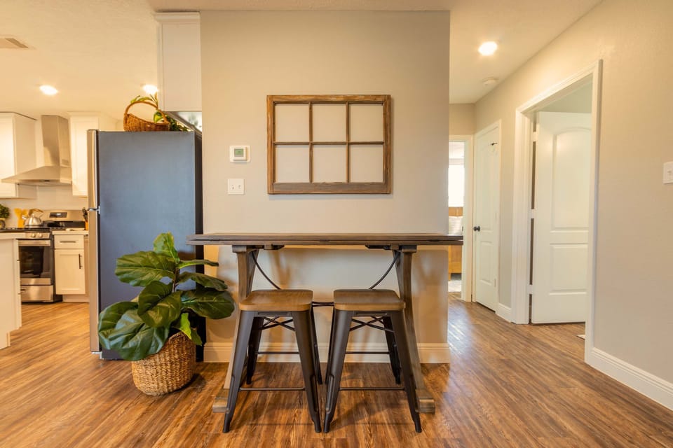 Dining Nook: Modern charm with a stylish bar table, perfect for brunch or late-night chats!