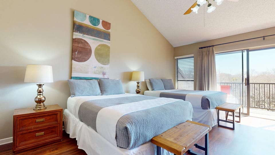 Primary suite with 2 queen beds