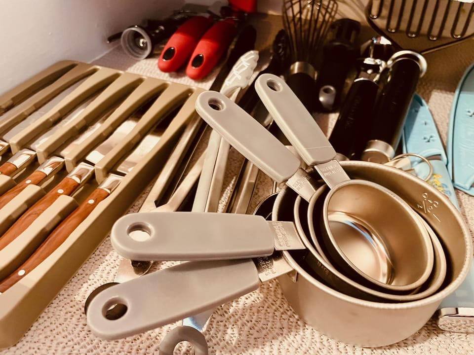 From Wine Opener to Measuring Cups, this fully stocked kitchen has it all.
