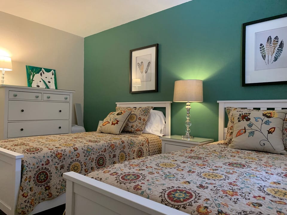 3rd bedroom with 2 twins and large dresser