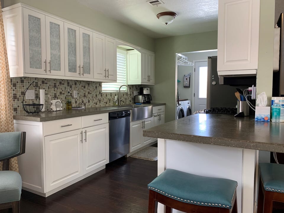 Kitchen...2 bar stools for island seating.  Full size washer/dryer in mud room.