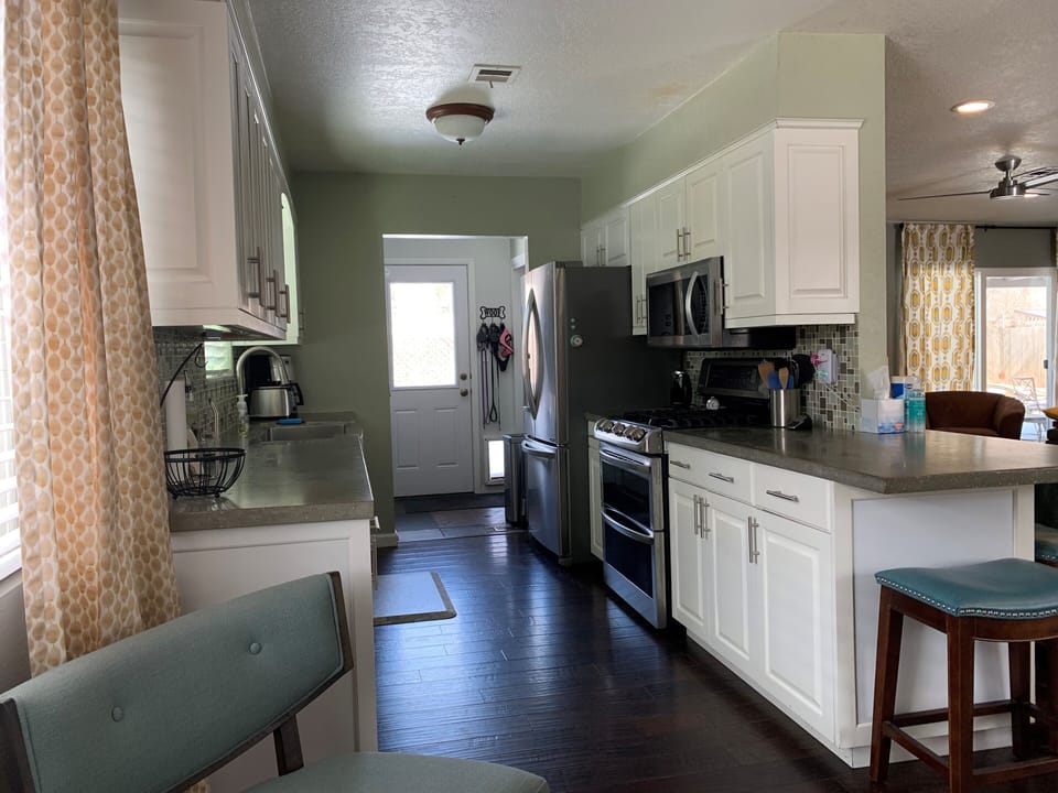 Kitchen...frig, freezer, gas oven and stove top, dishwasher, microwave.