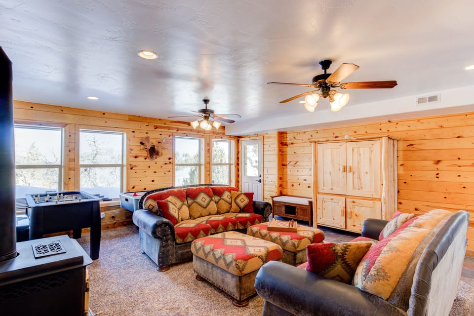 Basement Entertainment Room. TV and Board Games in the Armoire. Two Ceiling Fans