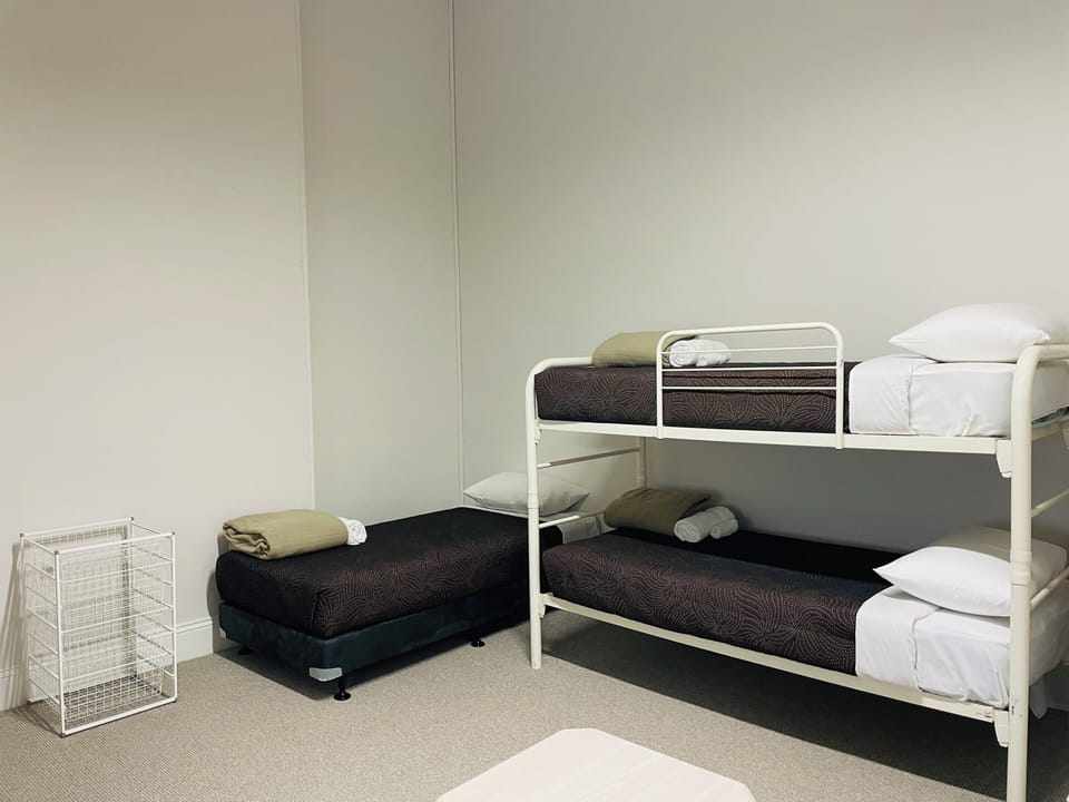 Sleeps 6-8 guests comfortably across two bedrooms plus a fold-out couch, ideal for couples or family getaways.