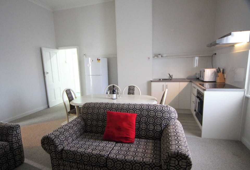 Includes Smart TVs, complimentary WiFi, well-equipped kitchens, and coin-operated laundry facilities for guest convenience.