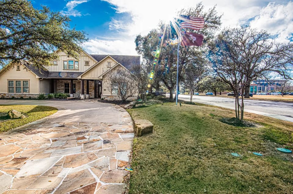 Front view of house - street pictured is George Bush Drive