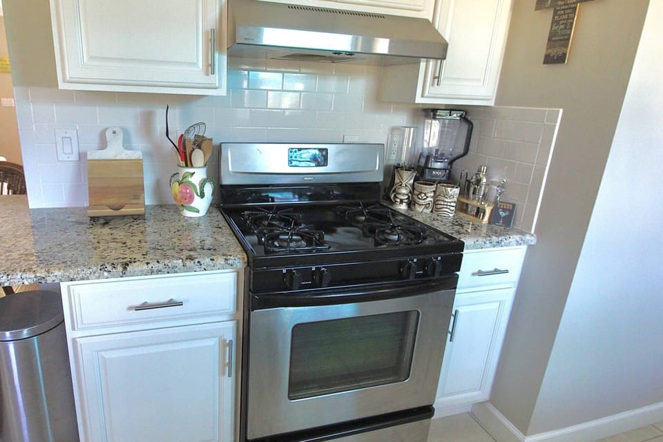 Beautiful gas range and stainless steel stove.