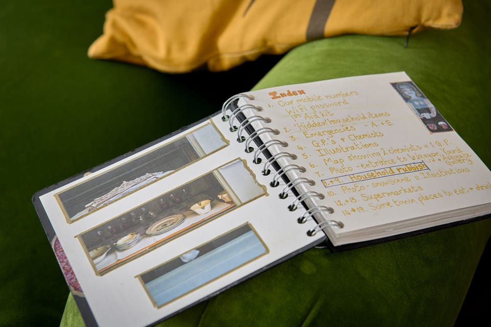 BOOK OF KNOWLEDGE  this home-made book with useful information, from the location of the first aid box to where the nearest beauty spot is.