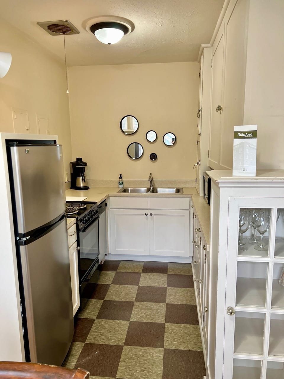 Beautiful vintage kitchen with dishwasher & stainless steel appliances 
