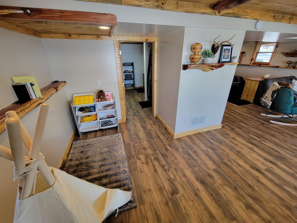 Kids area and then entrance to the basement bathroom