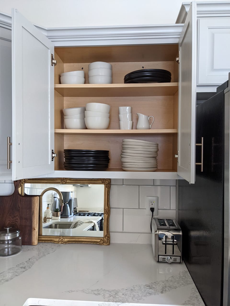 Stocked Dinnerware in full kitchen