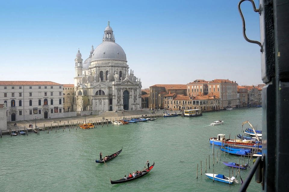 Bedroom and living room view of the cathedral of Santa Maria della Salute across the Grand Canal.