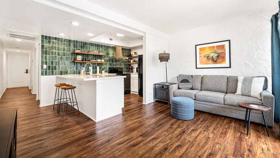 Entire unit remodeled using modern design principles with a touch of tropical style