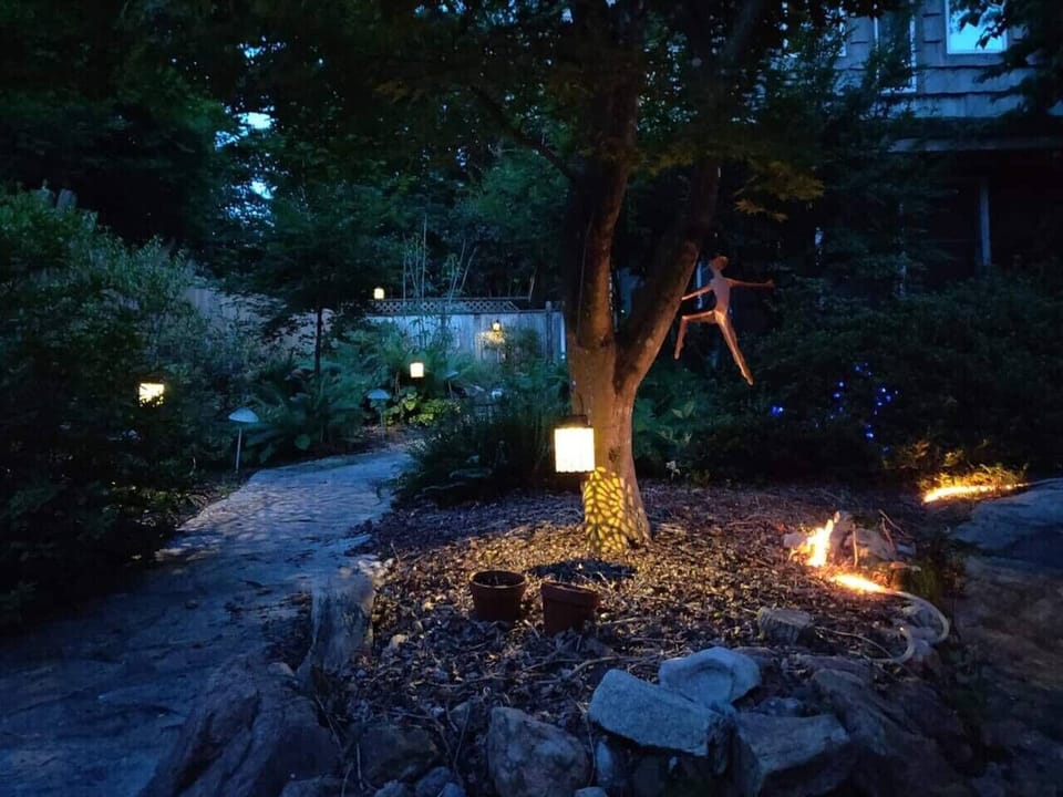 Take a stroll around the garden at dusk to hear the crickets and frogs as well as the calming trickling of water as it finds its way down the hand carved soapstone fountain, covered in moss, into the koi pond.
