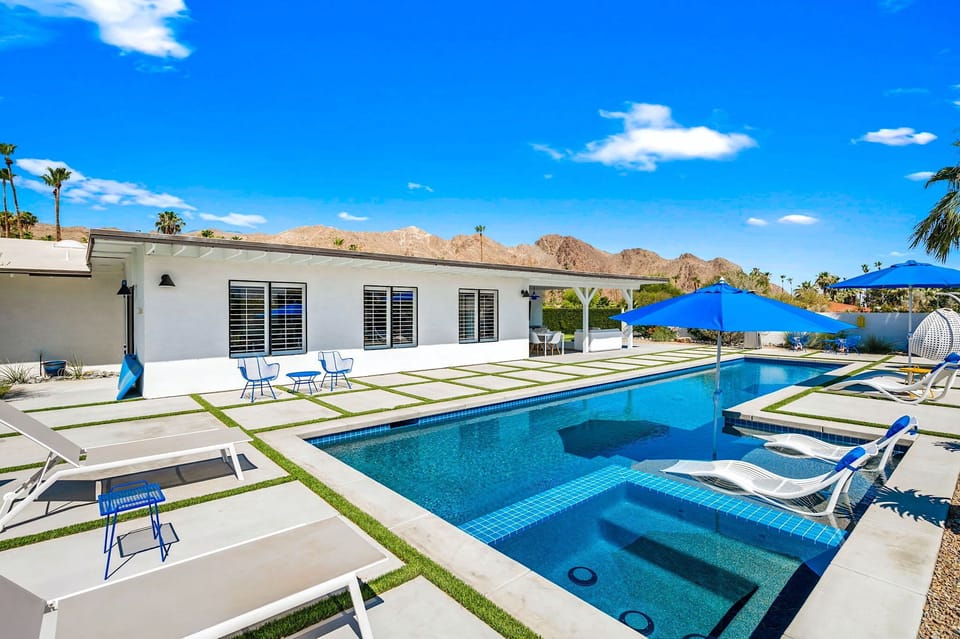 Salt water pebble tech pool with tanning shelf and spa. 