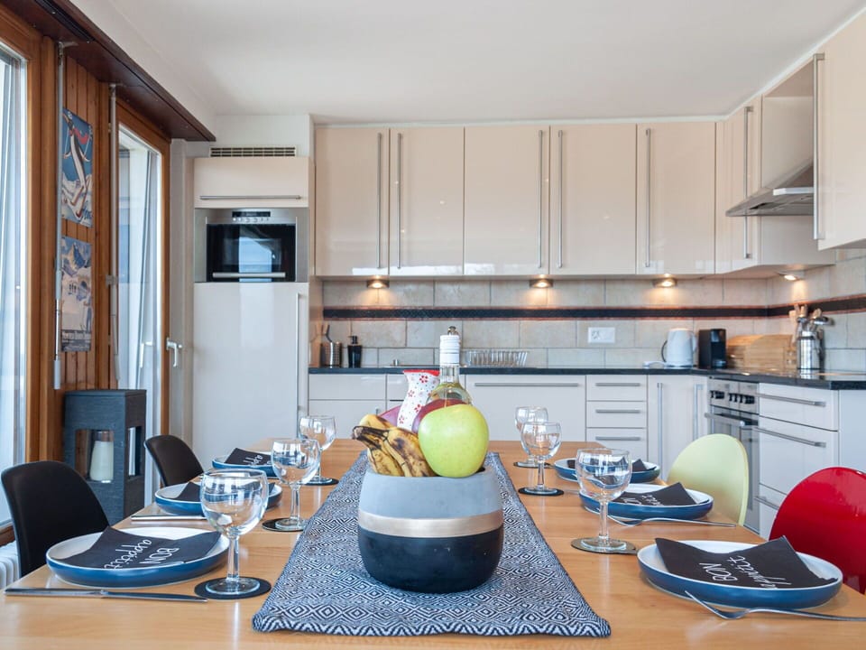 Countertop, Cabinetry, Furniture, Table, Property, Kitchen Stove, Tableware, Kitchen, Kitchen Appliance, Interior Design
