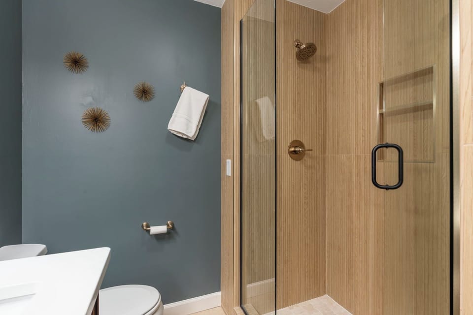Spacious spa-like walk in master shower with modern tile 