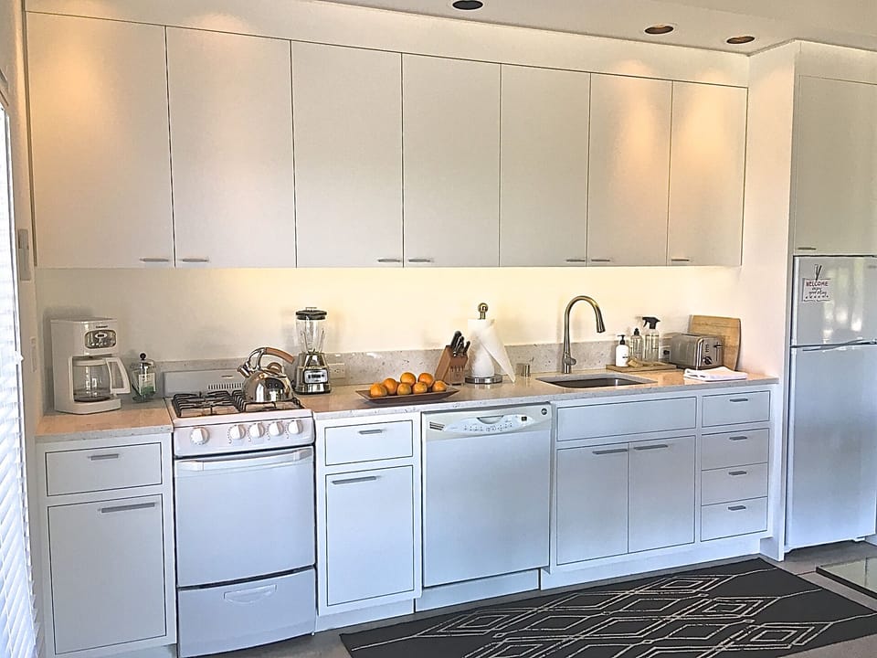 Sleek white kitchen with all you need.