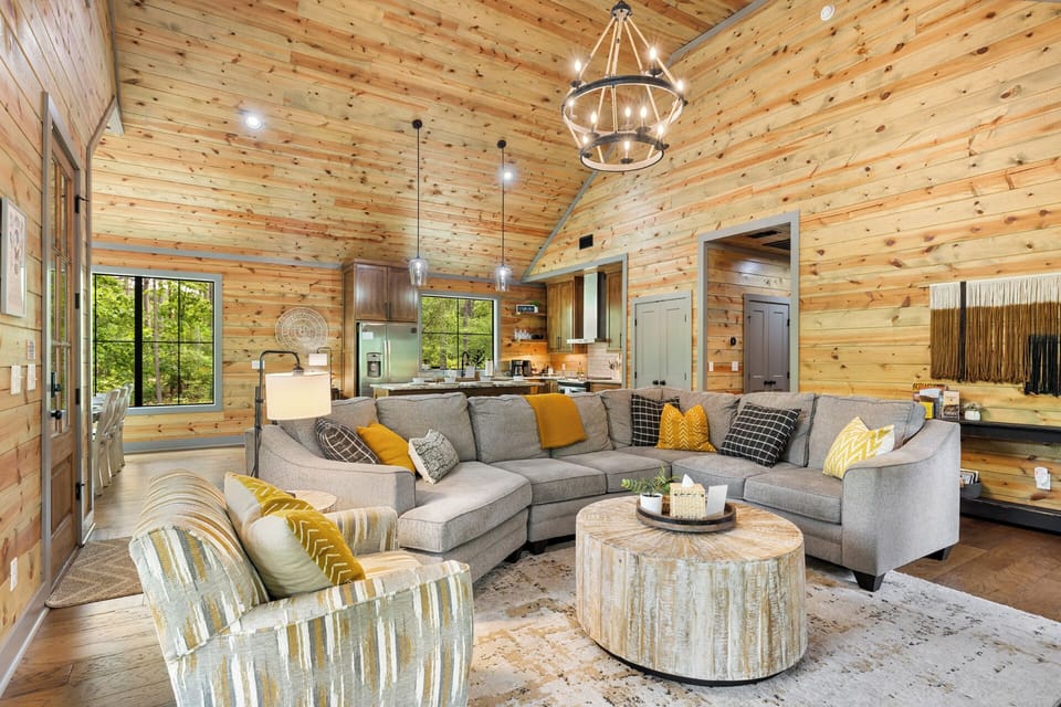 Our stunning living room with comfy seating for everyone to gather. 
