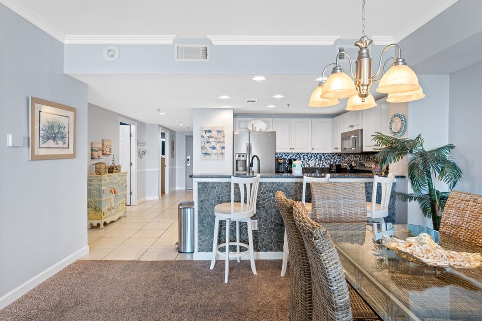 Open Concept Entryway, Dining Room & Kitchen