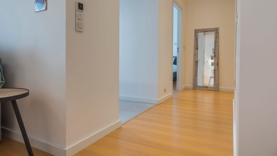 A large mirror is also provided in the hallway