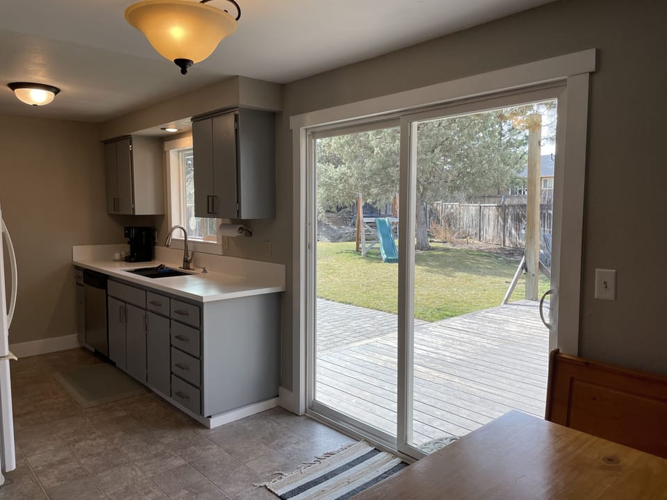 View of backyard from kitchen nook